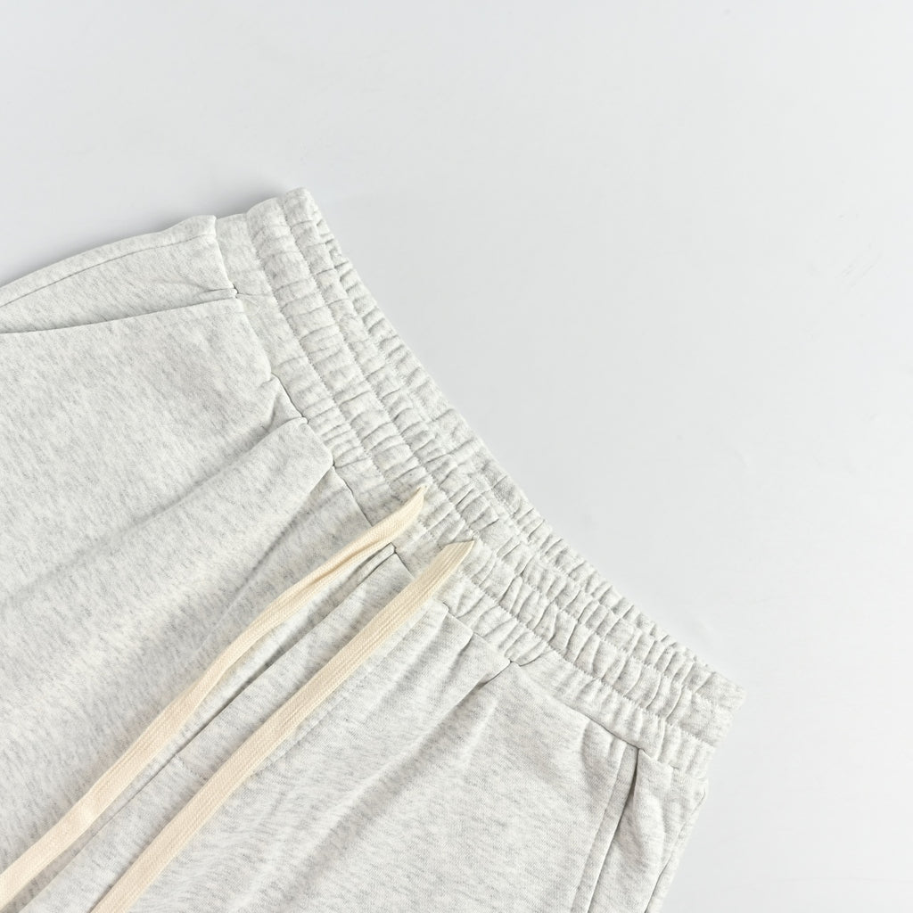 WE11DONE Silicone Logo Drawstring Fleece Shorts — White
