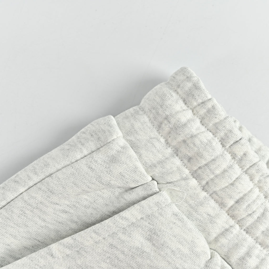 WE11DONE Silicone Logo Drawstring Fleece Shorts — White