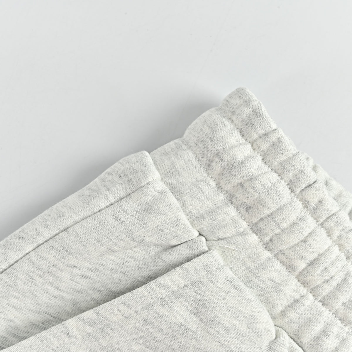 WE11DONE Silicone Logo Drawstring Fleece Shorts — White