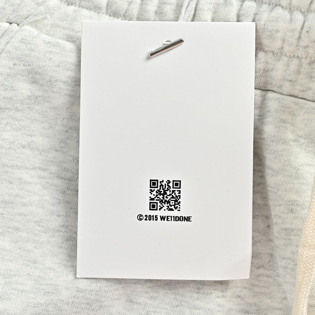 WE11DONE Silicone Logo Drawstring Fleece Shorts — White