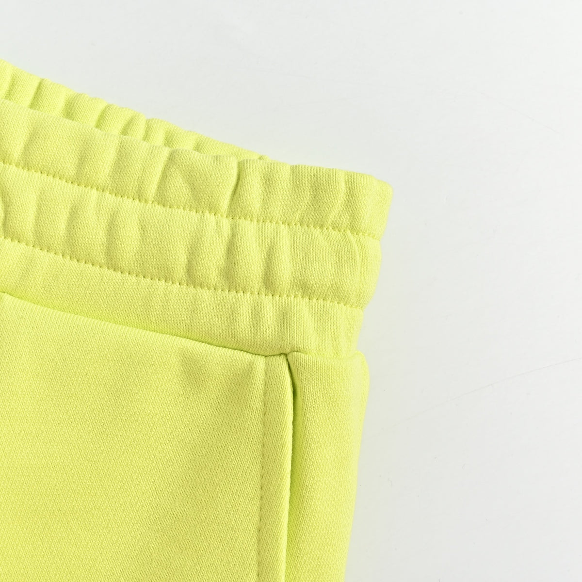 WE11DONE Silicone Logo Drawstring Fleece Shorts — Lime Yellow