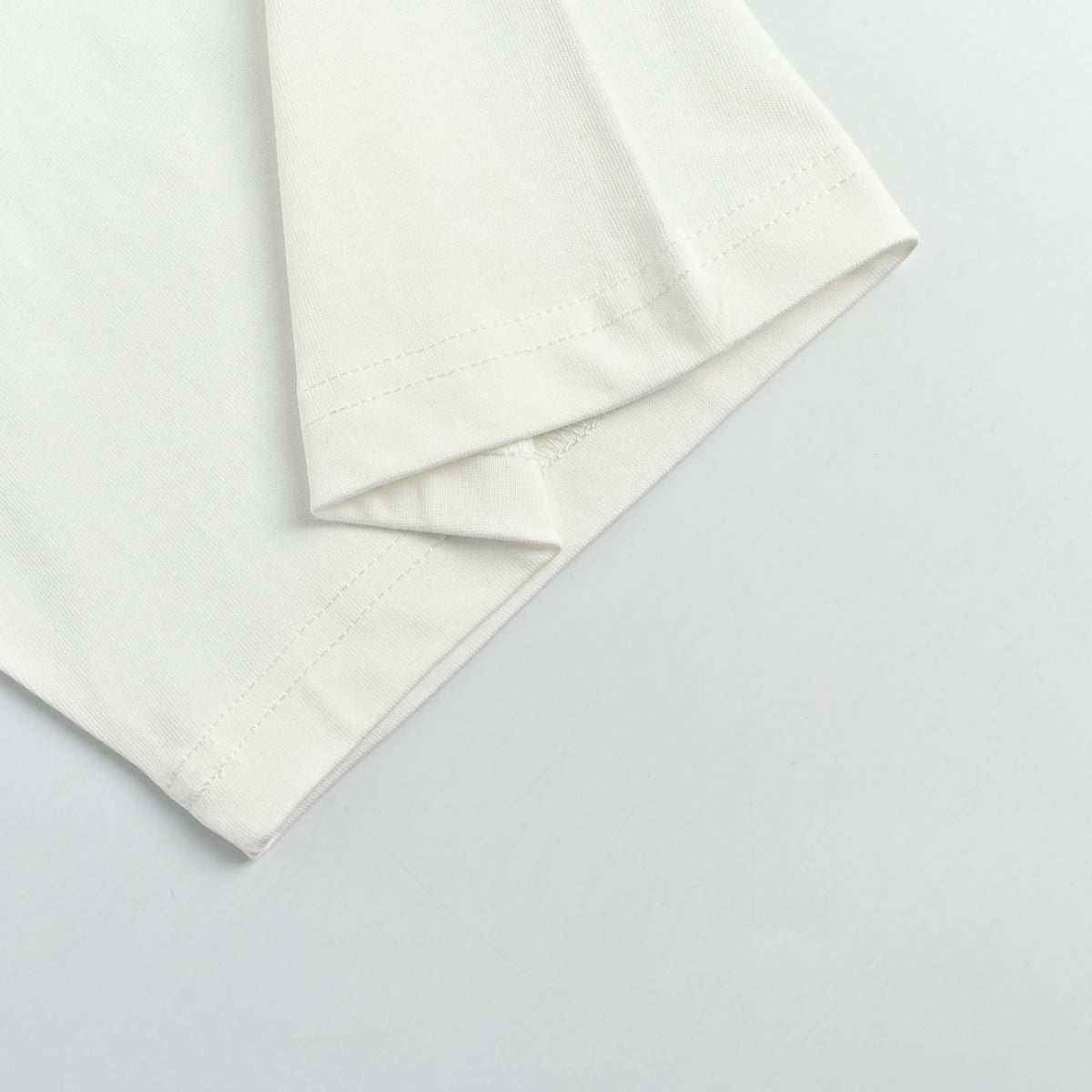 WE11DONE Minimal Letter Print Short Sleeve T-Shirt — White