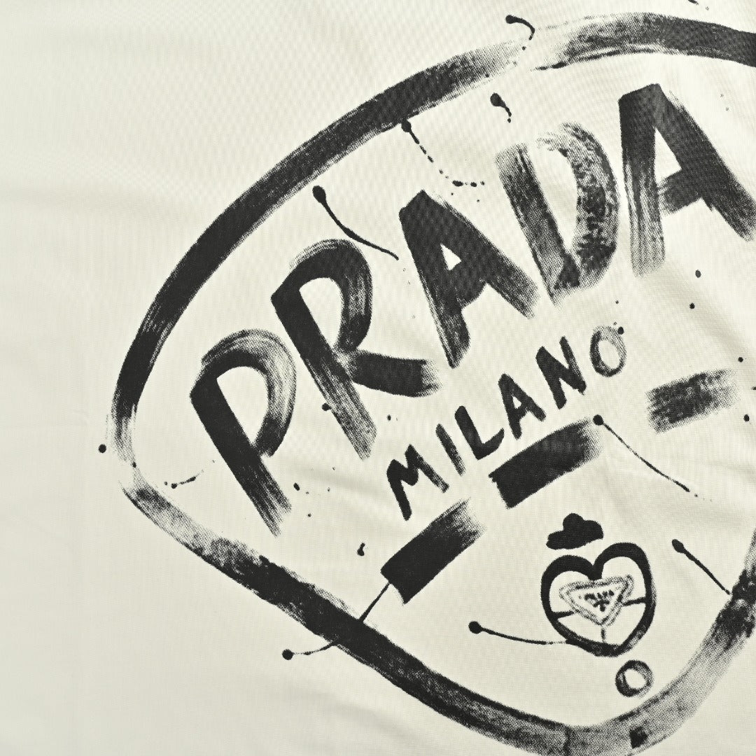 Prada 25FW Oversized Ink-Splash Logo Print Long-Sleeve T-Shirt – White